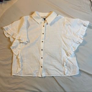 White Blouse with Ruffle sleeves.